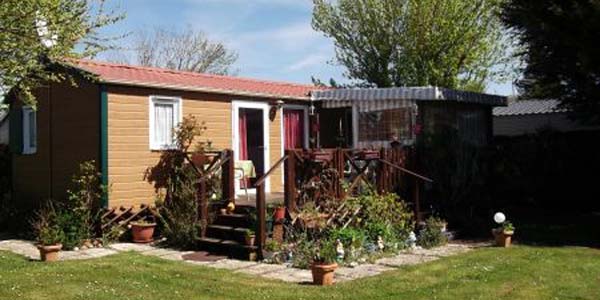 chalet camping a vendre